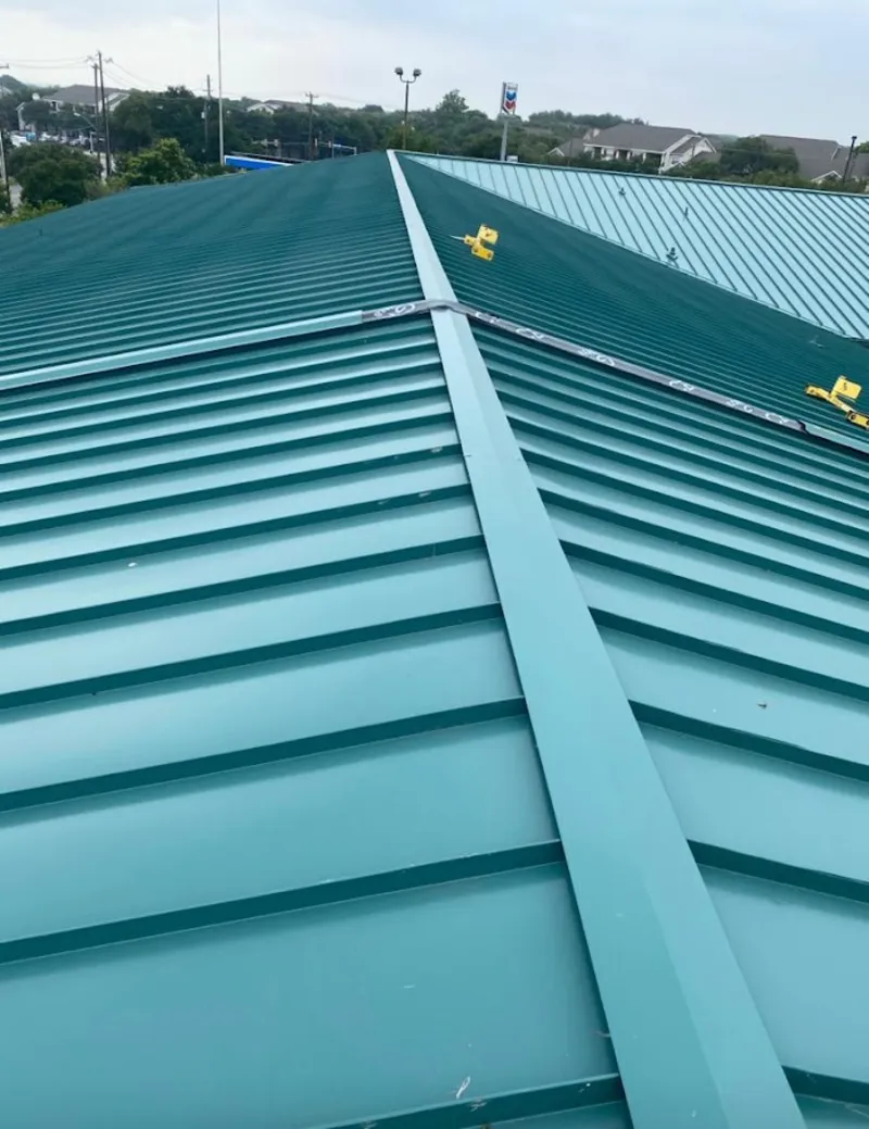 Green commercial metal roof ridge and valley for Metal Roof Repair in Caddo Mills