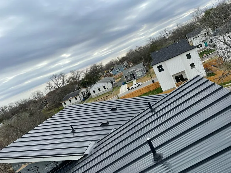Standing seam metal roof panels with vents for Skylight Repair in Caddo Mills